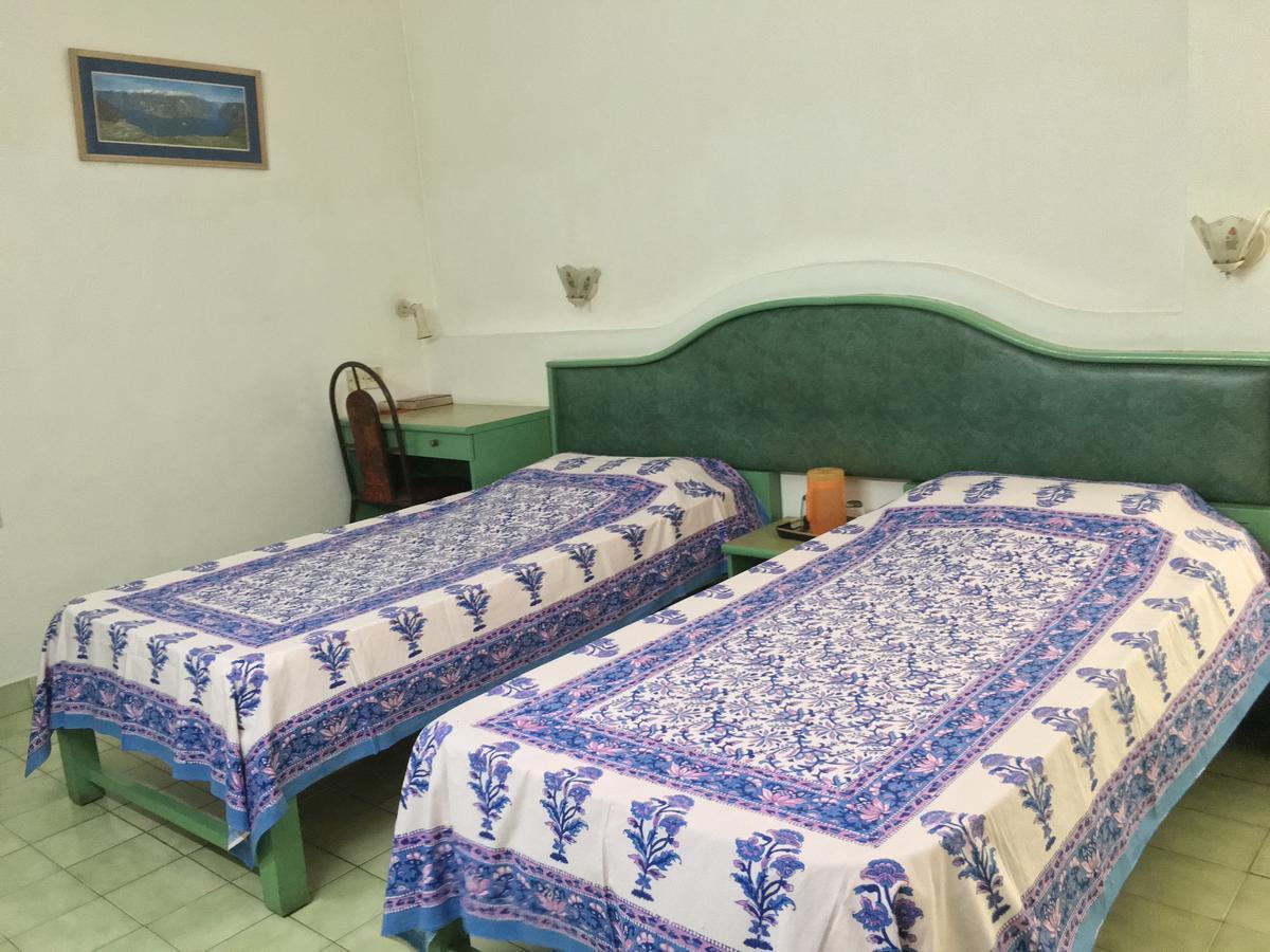 Homestead Hotel กัตตะยัม ภายนอก รูปภาพ